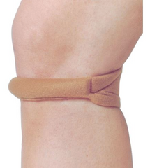 A woman's knee with a HealthyKin Cho-Pat Original Knee Strap - Large (14 1/2" - 16 1/2") Beige on it, recovering from Patellar Dislocation.