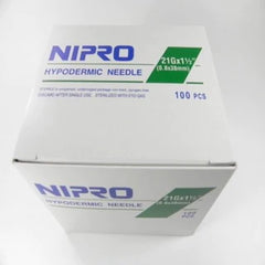A box of Nipro Disposable Hypodermic Needles 21G X 1 1/2" (50 Pack) and syringes on a white surface.