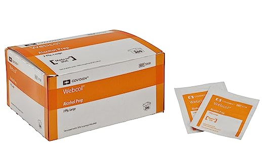 A box of Covidien Webcol Alcohol Prep Pads - Large (BOX of 200), including wound care essentials like alcohol prep pads, as well as a box of orange wipes.